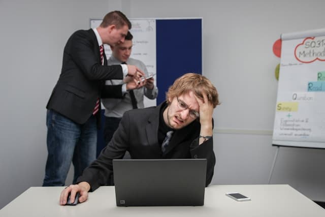 A frustrated team working through business challenges